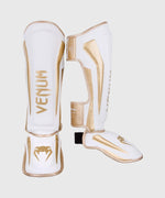 Espinilleras Venum Elite Standup - Blanco/Oro Foto 1