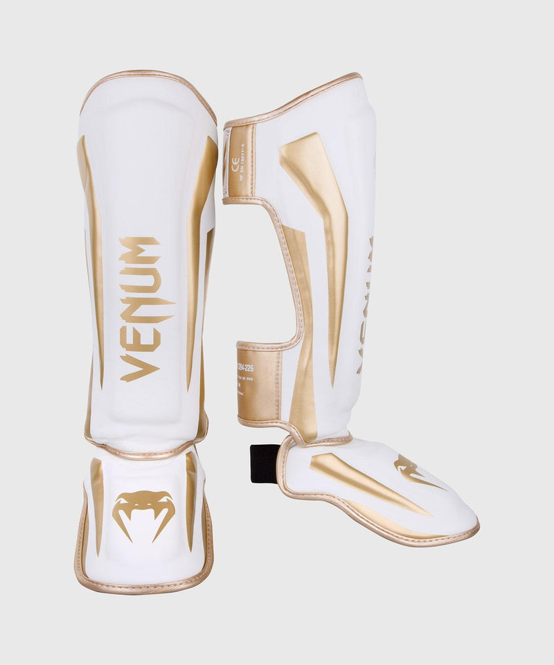 Espinilleras Venum Elite Standup - Blanco/Oro Foto 1