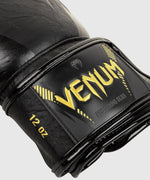 Guantes de Boxeo Venum Impact - Oro/Negro Foto 3