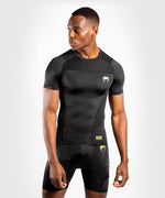 Venum G-Fit Rashguard - Manga corta - Negro/Oro Foto 1