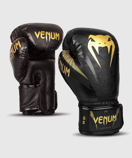 Guantes de Boxeo Venum Impact - Oro/Negro Foto 1