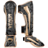 ESPINILLERAS VENUM ELITE - CAMO OSCURO/ORO