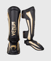 Espinilleras Venum Elite Standup - Negro/Oro Foto 1
