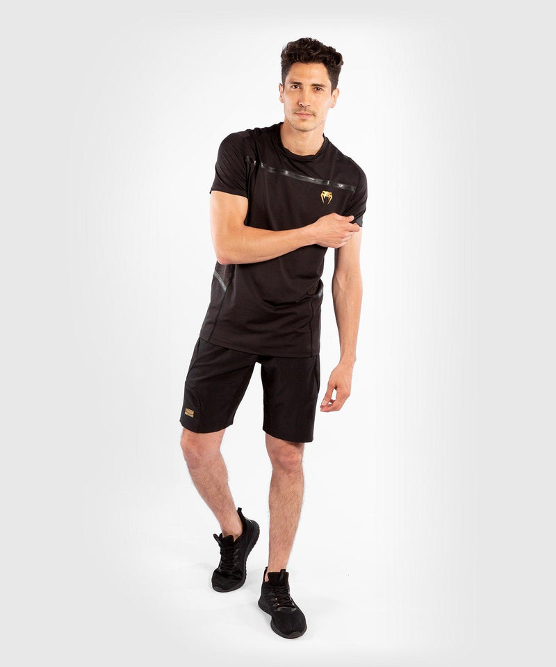 Camiseta Venum G-Fit Dry-Tech - Negro/Oro