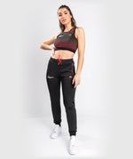 Pantalones de Chándal Venum UFC Performance Institute - Para mujer - Negro/Rojo