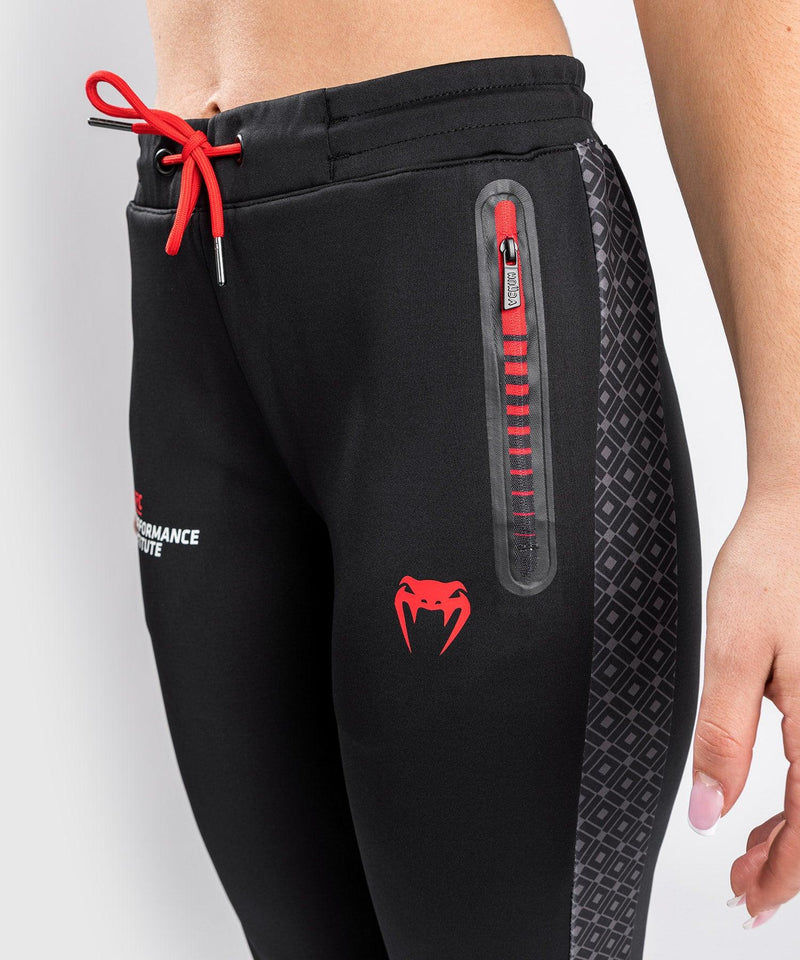 Pantalones de Chándal Venum UFC Performance Institute - Para mujer - Negro/Rojo