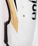 Espinilleras Venum Elite Evo - Blanco/Dorado Foto 4