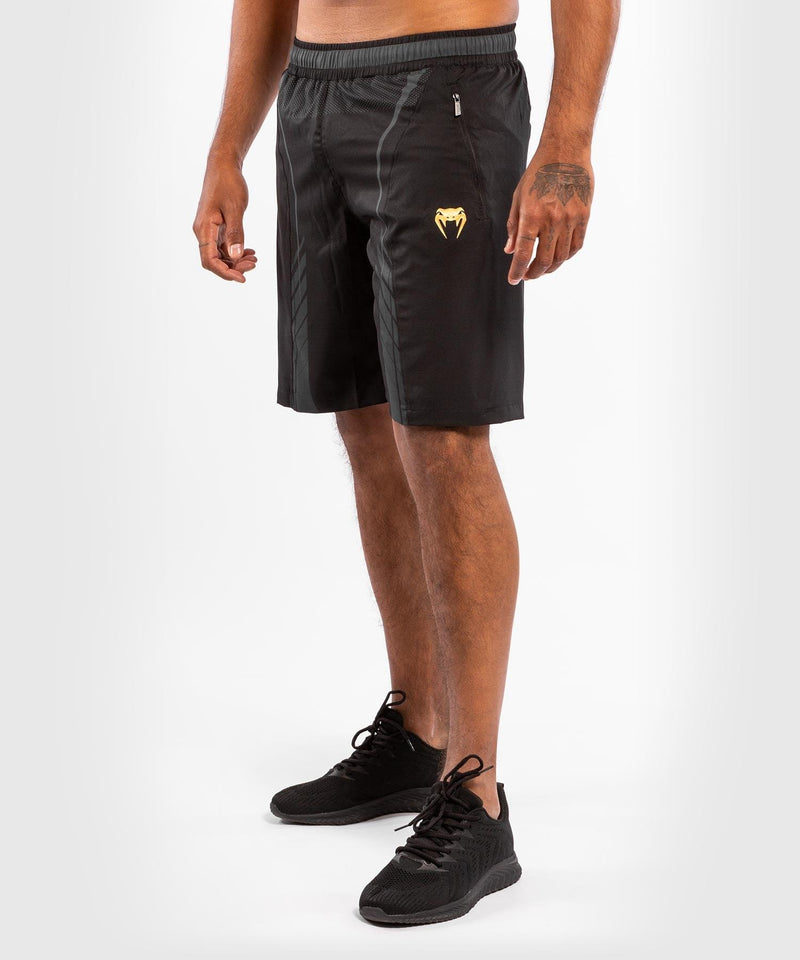 Shorts deportivos Venum Athletics - Negro/Dorado
