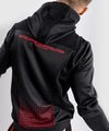 Sudadera con capucha Venum UFC Performance Institute - Negro/Rojo