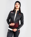 Chaqueta Venum UFC Performance Institute - Para mujer - Negro/Rojo