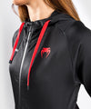 Sudadera con capucha Venum UFC Performance Institute - Para mujer - Negro/Rojo