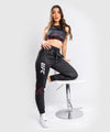 Pantalones deportivos UFC Venum Authentic Fight Week 2.0 - Para mujer - Negro/Rojo