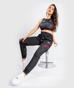 Pantalones deportivos UFC Venum Authentic Fight Week 2.0 - Para mujer - Negro/Rojo