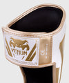 Espinilleras Venum Elite Standup - Blanco/Oro Foto 3