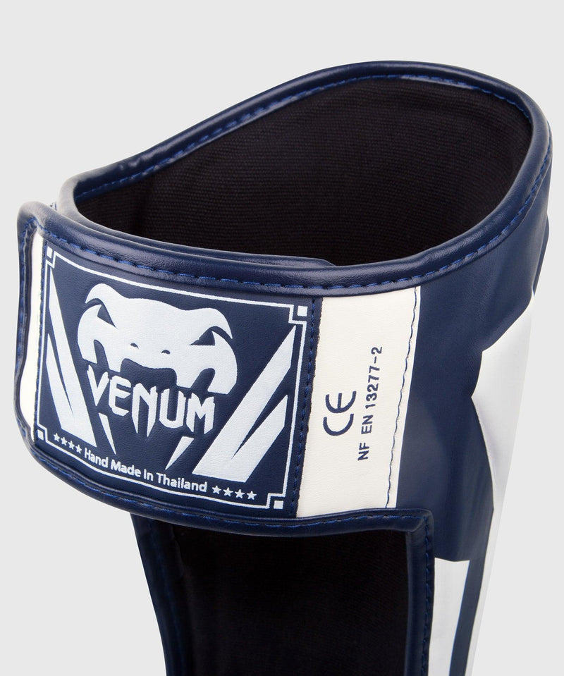 Espinilleras Venum Elite Standup - Blanco/Azul Marino Foto 3